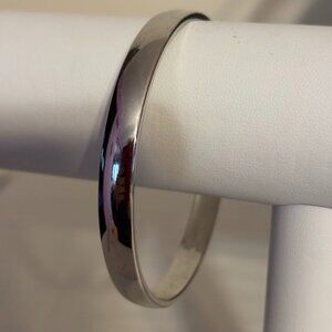 Beautiful Monet Silver Tone Bangle (size 8 1/4) for any occasion